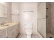 The bathroom features a vanity, toilet, and a shower with sliding glass doors at 548 W Linda Ln, Chandler, AZ 85225
