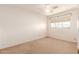 Bedroom featuring neutral carpet and a window providing natural light at 548 W Linda Ln, Chandler, AZ 85225