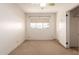 Bedroom featuring neutral carpet and a window providing natural light at 548 W Linda Ln, Chandler, AZ 85225