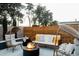 Relaxing backyard with fire pit, comfortable seating, and a wooden fence offering privacy and a cozy atmosphere at 5541 E Cheery Lynn Rd, Phoenix, AZ 85018