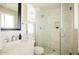 Modern bathroom featuring a walk-in shower with glass door, vanity, and updated finishes at 5541 E Cheery Lynn Rd, Phoenix, AZ 85018
