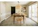 Dining area featuring a dark wood table, seating for eight, and a decorative light fixture at 5541 E Cheery Lynn Rd, Phoenix, AZ 85018