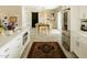 Open kitchen and dining area featuring a wooden table, slider door, and stainless steel refrigerator at 5541 E Cheery Lynn Rd, Phoenix, AZ 85018