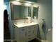 Bathroom featuring a vanity with a sink, ornate mirror, and modern fixtures at 6139 E Voltaire Ave, Scottsdale, AZ 85254