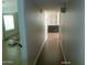 Inviting hallway featuring hardwood floors leading to an open floor plan at 6139 E Voltaire Ave, Scottsdale, AZ 85254