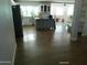Bright and airy kitchen featuring an island and open floor plan to living space at 6139 E Voltaire Ave, Scottsdale, AZ 85254