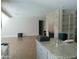 Spacious living room showcasing brick fireplace, built-in shelves and hardwood floors at 6139 E Voltaire Ave, Scottsdale, AZ 85254