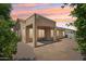 A spacious backyard with a paved patio area, perfect for outdoor entertaining and relaxation at 6781 W Lone Cactus Dr, Glendale, AZ 85308