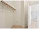A walk-in closet adjacent to the bathroom has open doorway to shower room at 6781 W Lone Cactus Dr, Glendale, AZ 85308