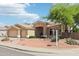 Charming single-story home featuring a well-maintained yard and a spacious three-car garage at 6781 W Lone Cactus Dr, Glendale, AZ 85308