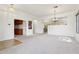 Open floorplan from living room features entry to dining and kitchen area at 6781 W Lone Cactus Dr, Glendale, AZ 85308