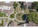 Overhead view of the landscaped common areas showcasing mature trees and manicured grounds at 7575 E Indian Bend Rd # 1142, Scottsdale, AZ 85250