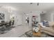 Open-concept living area with a view of the dining room and a glimpse of the kitchen at 7575 E Indian Bend Rd # 1142, Scottsdale, AZ 85250