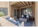 Comfortable outdoor patio with seating and a view of the surrounding landscape at 7575 E Indian Bend Rd # 1142, Scottsdale, AZ 85250