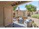 Cozy outdoor patio with comfortable seating and a view of the surrounding landscape at 7575 E Indian Bend Rd # 1142, Scottsdale, AZ 85250