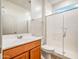 Clean bathroom with a wood vanity, white countertop, and a glass enclosed shower stall at 7648 S Thimble Peak --, Gold Canyon, AZ 85118
