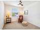 Cozy bedroom with neutral carpet, a reading chair, and ample natural light at 7648 S Thimble Peak --, Gold Canyon, AZ 85118