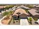 Charming single-Gathering home with tile roof, desert landscaping, and an attached two-car garage at 7648 S Thimble Peak --, Gold Canyon, AZ 85118