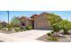Lovely single-story home with low-maintenance desert landscaping and an attached two-car garage at 7648 S Thimble Peak --, Gold Canyon, AZ 85118