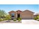Inviting single-Gathering home with desert landscaping and an attached two-car garage at 7648 S Thimble Peak --, Gold Canyon, AZ 85118