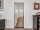 Inviting hallway featuring wood-look floors and a view into the home at 7648 S Thimble Peak --, Gold Canyon, AZ 85118