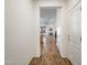 Bright hallway leading into an open-concept living and kitchen area at 7648 S Thimble Peak --, Gold Canyon, AZ 85118