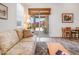 Bright living room with a sliding glass door to the patio bringing the outdoors in at 7648 S Thimble Peak --, Gold Canyon, AZ 85118
