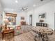 Bright living room with a ceiling fan and view to outdoor patio at 7648 S Thimble Peak --, Gold Canyon, AZ 85118
