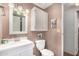 A well-lit bathroom features a modern vanity, toilet, medicine cabinet, and a neutral color scheme at 8103 E Southern Ave # 75, Mesa, AZ 85209