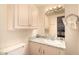 Small bathroom with a single sink, vanity, and ample storage and vanity lighting at 8103 E Southern Ave # 75, Mesa, AZ 85209