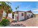 Palm trees accentuate this home's exterior, which includes a covered carport and low-maintenance landscaping at 8103 E Southern Ave # 75, Mesa, AZ 85209