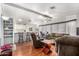 Spacious open-concept living area with wood floors and ample seating at 8103 E Southern Ave # 75, Mesa, AZ 85209