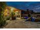 Backyard with a pool and a covered patio, complete with outdoor seating, great for entertaining at 9678 E Voltaire Dr, Scottsdale, AZ 85260