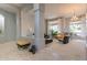 Open-concept living room with neutral tones, plush seating, and plenty of natural light at 9678 E Voltaire Dr, Scottsdale, AZ 85260