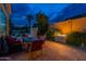 Outdoor patio area features a fire pit and comfortable seating for evening relaxation at 9678 E Voltaire Dr, Scottsdale, AZ 85260