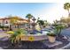 Scenic view of the community's water feature, lush landscaping and surrounding buildings at 10410 N Cave Creek Rd # 2030, Phoenix, AZ 85020