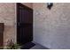 Close up of front door with security screen and front door with address on sign at 10410 N Cave Creek Rd # 2030, Phoenix, AZ 85020