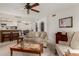 Wide view of the living room showing the open floor plan with kitchen and dining room area at 10410 N Cave Creek Rd # 2030, Phoenix, AZ 85020