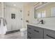 Stylish bathroom with a walk-in shower, modern vanity, and sleek fixtures at 11215 N 38Th N Ave, Phoenix, AZ 85029