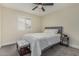 Comfortable bedroom featuring a soft bed, a bedside table, and ample natural light at 11215 N 38Th N Ave, Phoenix, AZ 85029