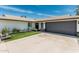Charming single-story home with a well-manicured front yard and a two-car garage at 11215 N 38Th N Ave, Phoenix, AZ 85029
