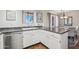 Kitchen with stainless steel appliances, light cabinetry, and view to the dining area at 12222 N Paradise Village S Pkwy # 442, Phoenix, AZ 85032