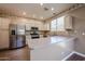 Well-lit kitchen features stainless steel appliances and plenty of cabinet space at 125 N 22 Pl # 14, Mesa, AZ 85213