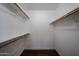 A walk-in closet with wall to wall shelving and neutral walls at 125 N 22 Pl # 14, Mesa, AZ 85213