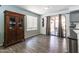 Dining area with sliding glass doors leading to the backyard and natural light at 13709 W Rovey Ave, Litchfield Park, AZ 85340