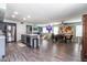 Bright kitchen with grey cabinets, stainless appliances, and an open layout that is great for entertaining guests at 13709 W Rovey Ave, Litchfield Park, AZ 85340