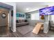 Cozy living room with calming colors, a plush couch, and wall art, creating a relaxing atmosphere at 13709 W Rovey Ave, Litchfield Park, AZ 85340