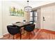 Dining room featuring hardwood floors, chandelier, and a modern dining set at 14910 N Kings Way # 105, Fountain Hills, AZ 85268