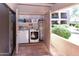 Convenient outdoor laundry closet with washer, dryer, and water heater on a tiled patio at 14910 N Kings Way # 105, Fountain Hills, AZ 85268