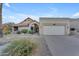 Charming single-story home with a spacious three car garage and desert landscaping at 15232 S 36Th Pl, Phoenix, AZ 85044